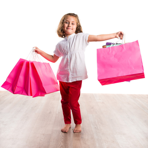 Girl with many shopping bags - Zdjęcie, obraz