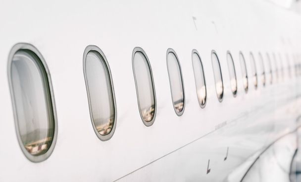 Passenger aircraft windows. View from outside. - Photo, Image
