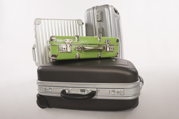 Variety of suitcases and luggage on white background - Foto, immagini
