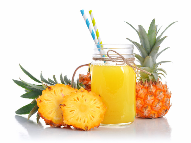 Pineapple juice in glass jar with handle - Foto, imagen