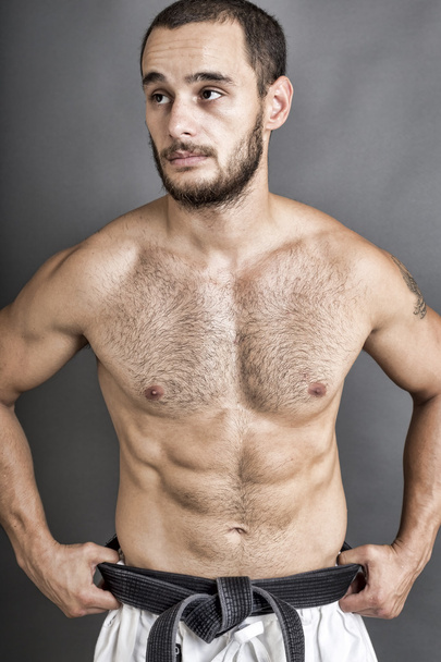 Portrait of young shirtless man  posing - Foto, Bild
