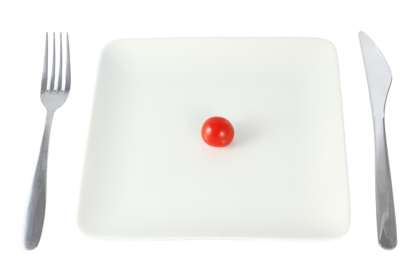 Tomates cereja em uma placa branca isolada no fundo branco
 - Foto, Imagem