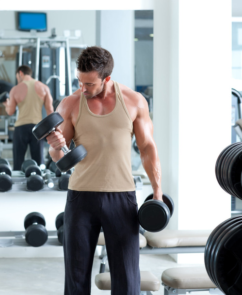 Man with weight training equipment on sport gym - Фото, зображення