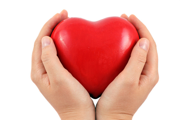 ein rotes Herz in einer Hand - Foto, Bild