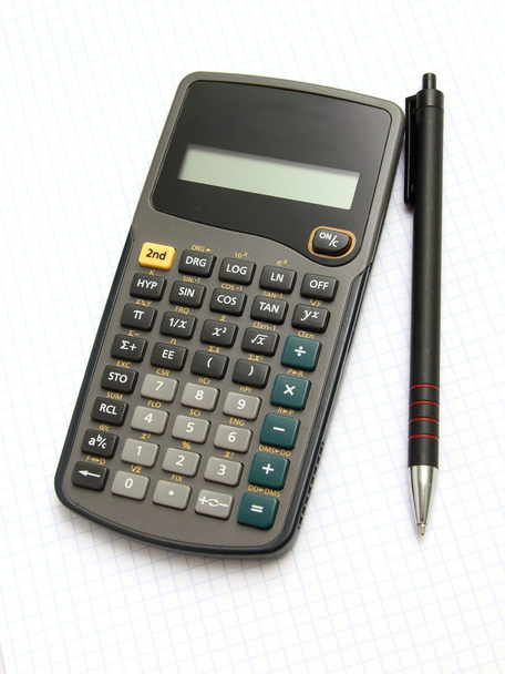 Науковий калькулятор і сковорода на папері для ноутбуків
 - Фото, зображення