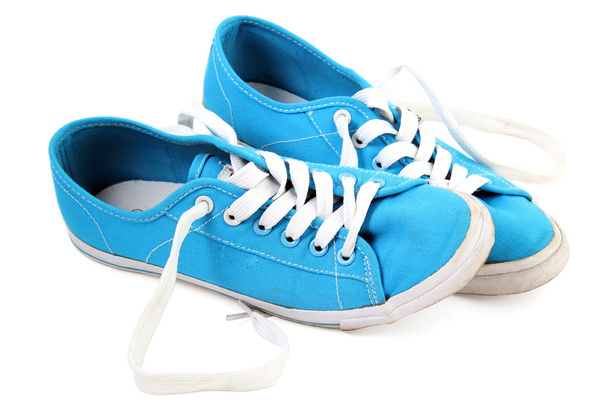 Kék tornacipő fehér alapon - Fotó, kép