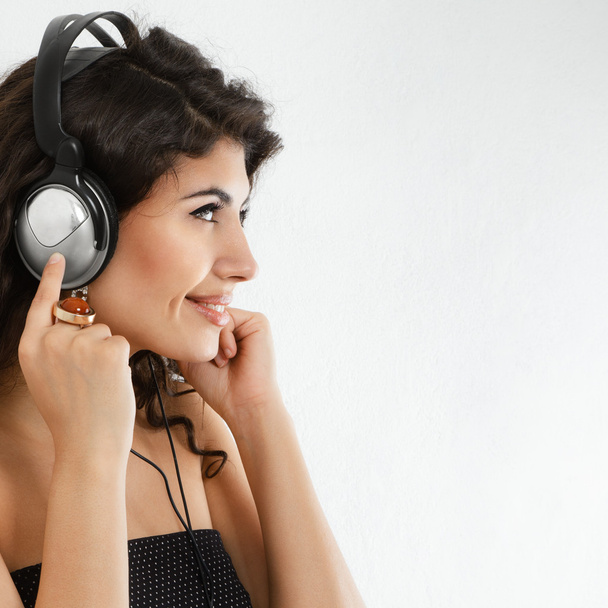 Woman listening music - Fotó, kép