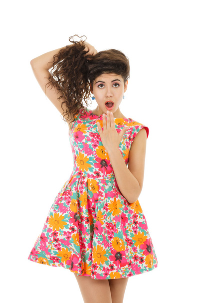 Surprised woman in mini dress - Foto, Imagen
