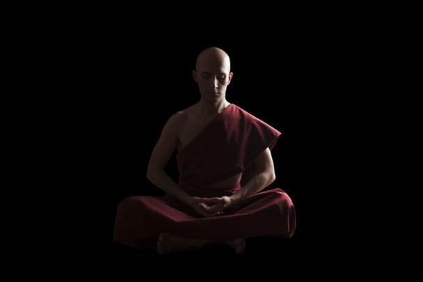 buddhist monk in meditation pose - Fotó, kép