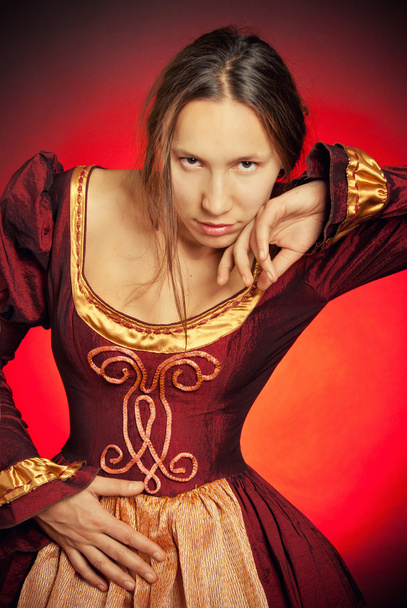 Medieval girl in the maroon dress - Photo, Image