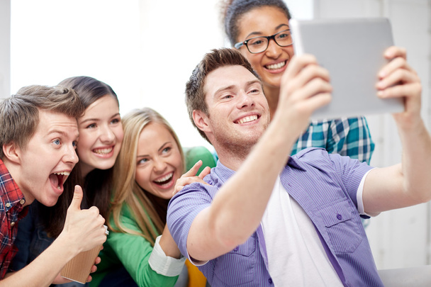 group of happy high school students with tablet pc - Zdjęcie, obraz
