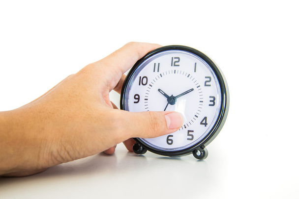 hand bedrijf alarm clock - Foto, afbeelding
