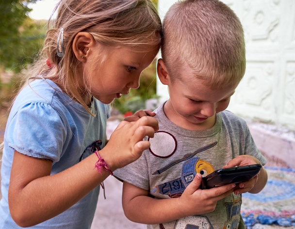 Children play with smartphone - Photo, Image