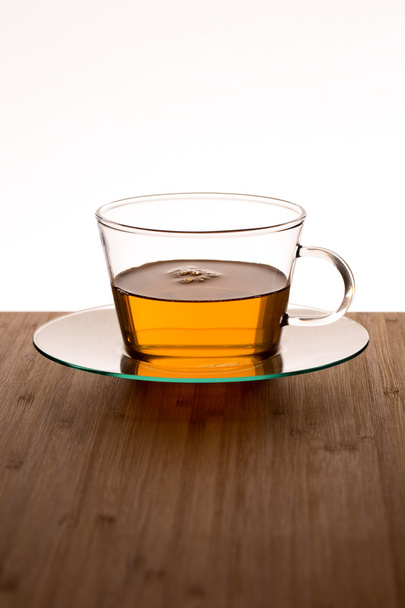 Cup of tea  on a wooden background - Fotografie, Obrázek