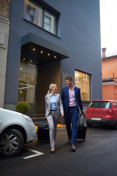 business people couple entering  hotel - Photo, Image