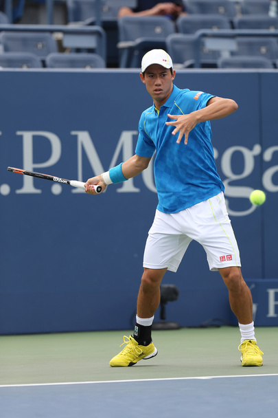 Professional tennis player Kei Nishikori of Japan in action during first round match at US Open 2015 - Photo, Image