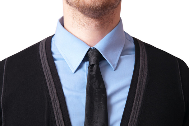 Primer plano de una corbata con camisa y cárdigan
 - Foto, Imagen