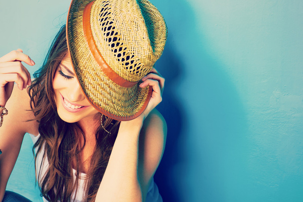 Smiling woman in straw hat - 写真・画像