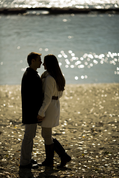 Young couple by the river - Photo, Image