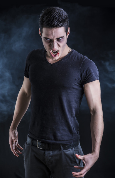 Portrait of a Young Vampire Man with Black T-Shirt - Fotoğraf, Görsel