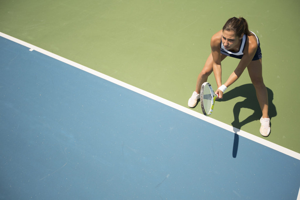 Donna che gioca a tennis
 - Foto, immagini