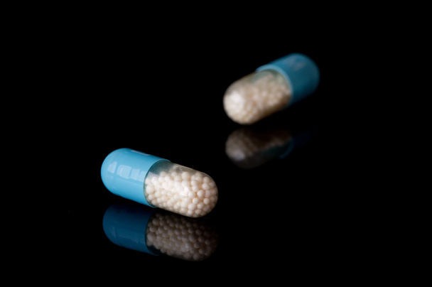 blauwe capsules - Foto, afbeelding