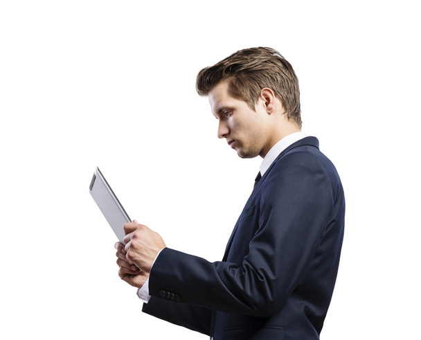 Young handsome businessman with tablet - 写真・画像