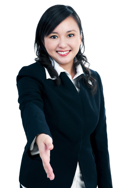Attractive businesswoman offering handshake - 写真・画像