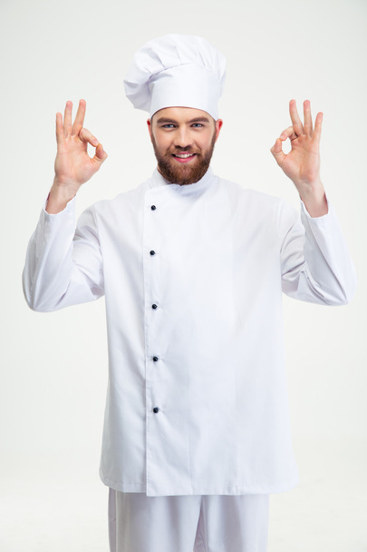 Male chef cook showing ok sign - Foto, afbeelding
