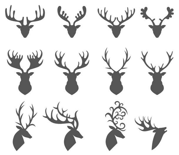 白地に鹿の頭のシルエットのセット - ベクター画像