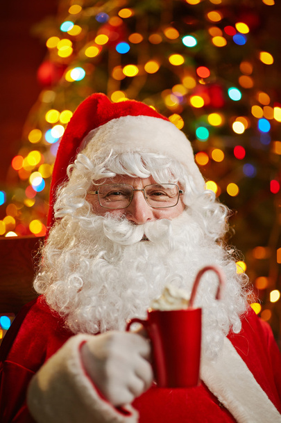 Santa Claus with cup of latte - 写真・画像