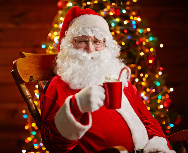 Santa Claus with cup of latte - Фото, зображення