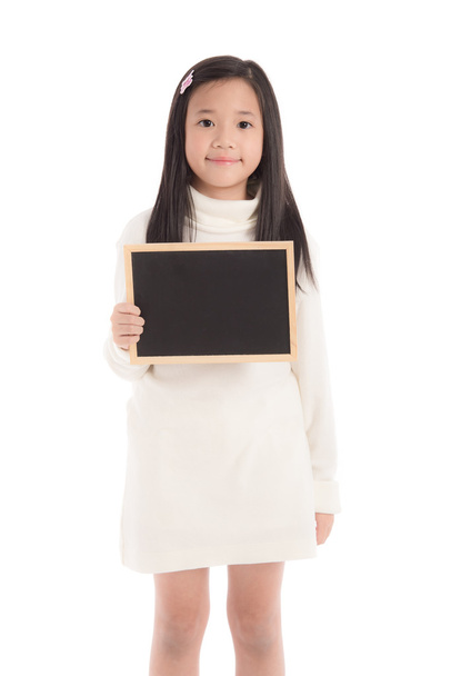 bonito ásia menina no branco gola alta vestido segurando blackboard
 - Foto, Imagem