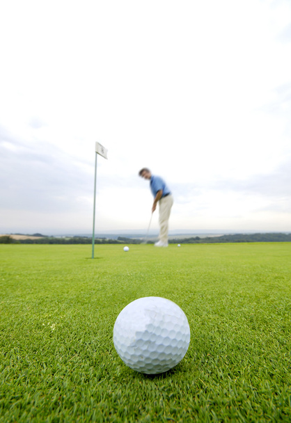 Jugar al golf
 - Foto, imagen