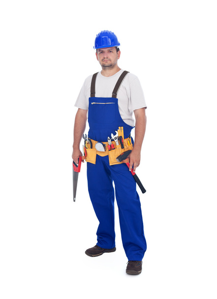 údržbář nebo stavební dělník stojící se spoustou nástrojů - Fotografie, Obrázek