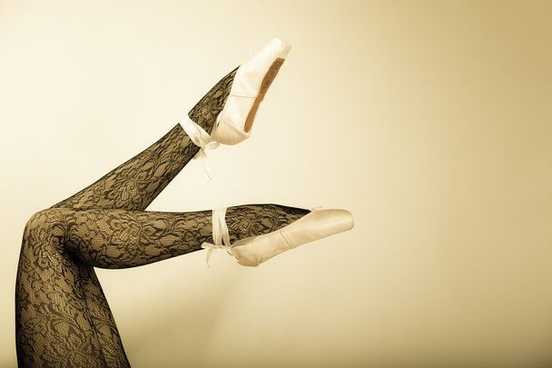 Female legs dancer in ballet shoes - Foto, Imagen