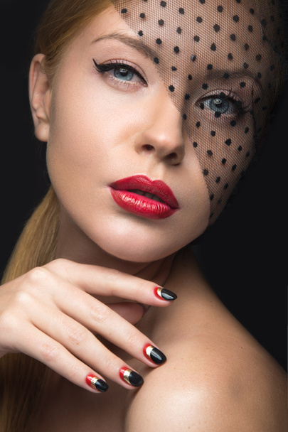 Beautiful girl with a veil, evening makeup, black and red nails. Design manicure. Beauty face. - Fotó, kép