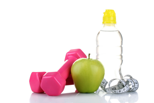 Dieta, botella de agua y cinta métrica
 - Foto, imagen