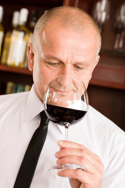 Bar waiter smell glass red wine restaurant - Foto, afbeelding