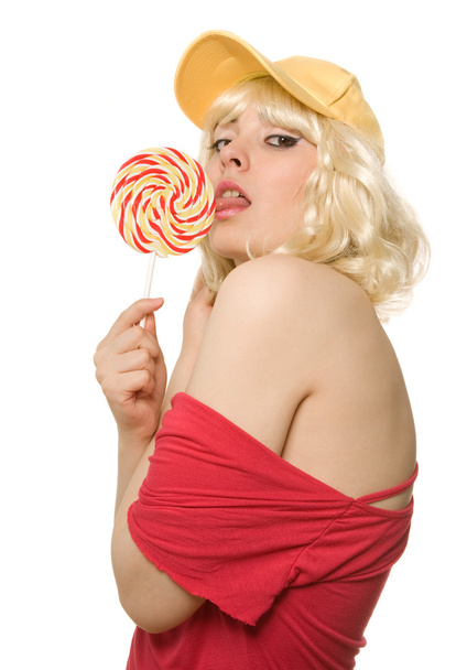 Woman in cap with lollipop - Φωτογραφία, εικόνα