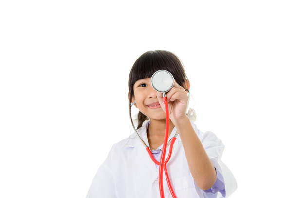Asian girl in doctor's coat - Фото, изображение