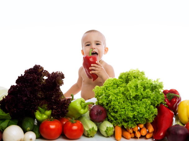 Cute baby with different vegetables - Photo, Image