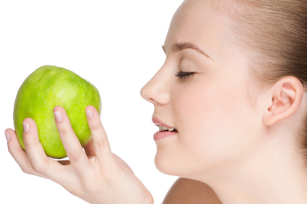 Woman eat green apple - Photo, Image