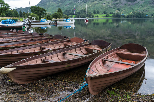 Old Wooden Rowing Fishing Boat Moored Near Lake Or River Coast In