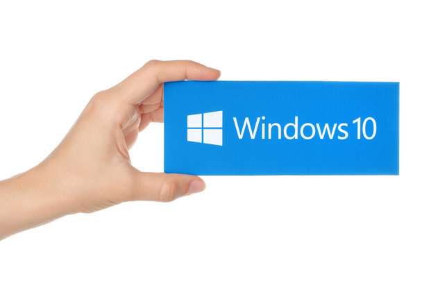Hand holds Windows 10 logotype printed on paper - Photo, Image