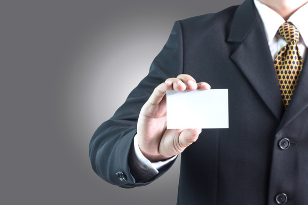 Asian businessman holding empty white card - Foto, imagen