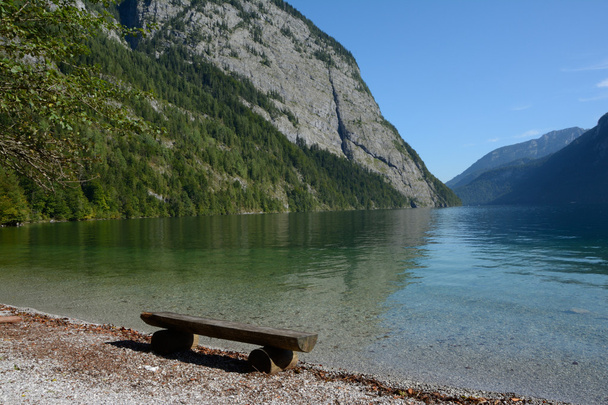 Wooden bench at Koenigssee lake - Fotó, kép