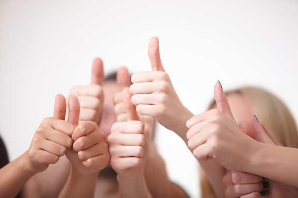 people gesturing thumbs up - Foto, imagen