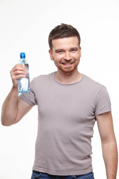 man with bottle of water - Fotó, kép