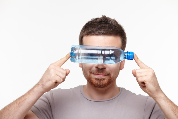 Man with bottle of water - Foto, Bild